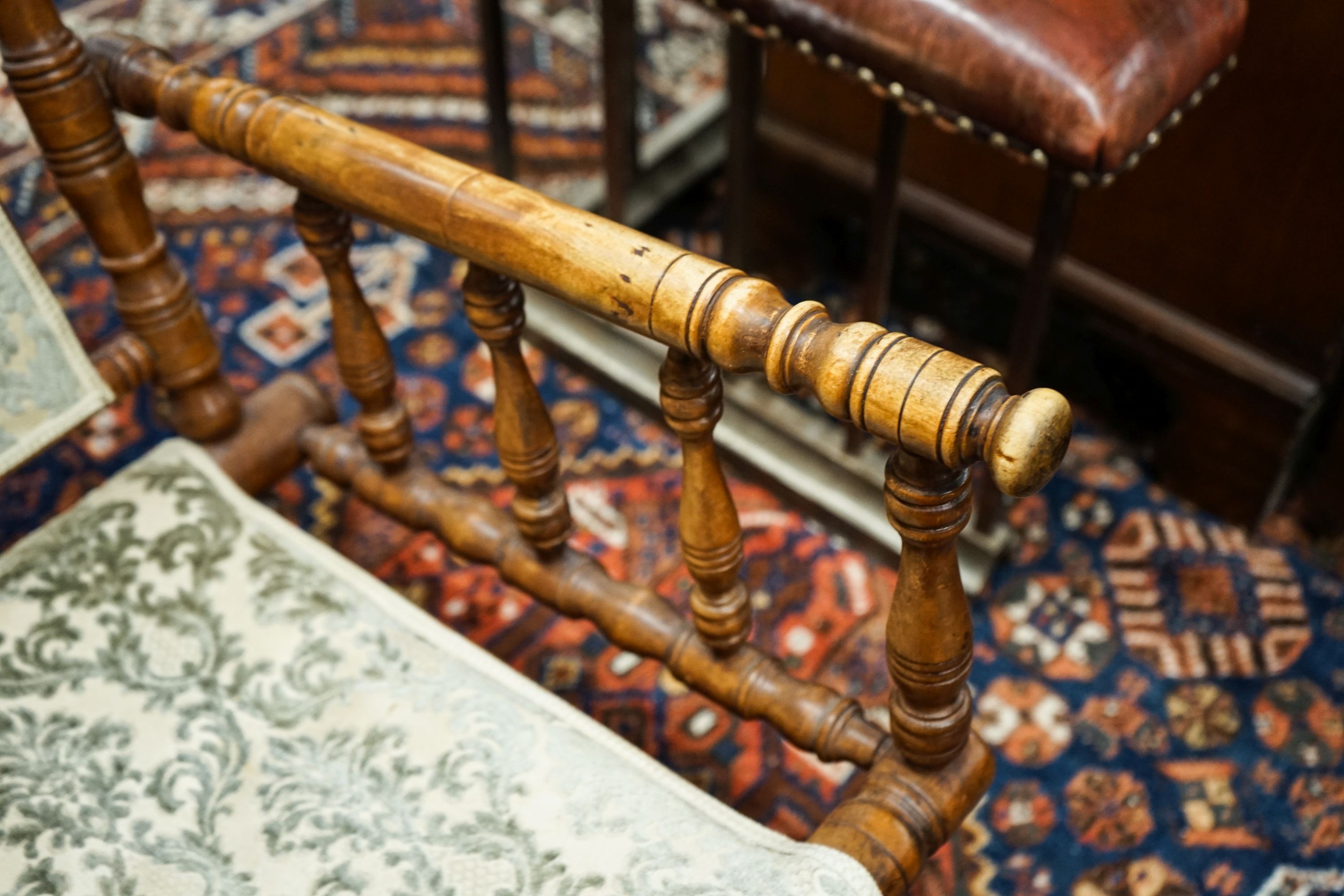 An early 20th century American rocking chair, width 54cm, depth 50cm, height 106cm